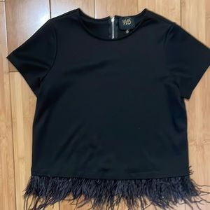 Black top with feather detail. Size Small